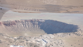 87 6ww. Markus's photo - meteor crater and N4372J in-flight photo