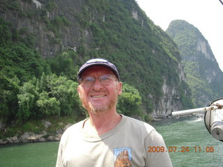 262 6xq. China eclipse - Li River  boat tour - Adam