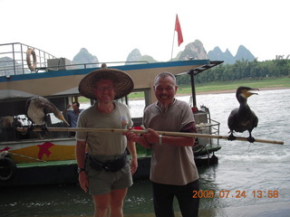 463 6xq. China eclipse - Li River  boat tour - Adam and cool show birds