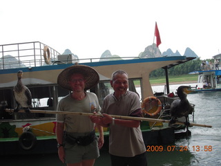 464 6xq. China eclipse - Li River  boat tour - Adam and cool show birds
