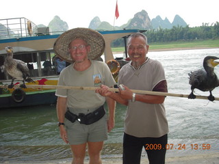 465 6xq. China eclipse - Li River  boat tour - Adam and cool show birds (the good one)