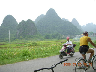 187 6xr. China eclipse - Yangshuo bicycle ride - Adam riding