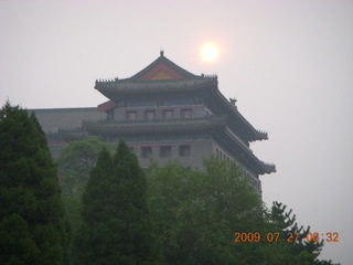 China eclipse - Beijing morning run - soft sun on ancient pagoda