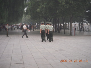 24 6xu. China eclipse - Beijing morning run - police