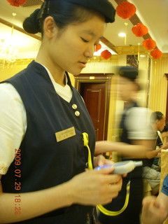 235 6xv. China eclipse - Beijing - dinner with Jack's parents - waitress texting our order
