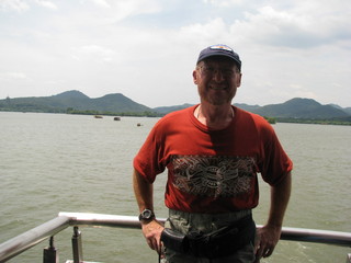 4 6xy. China eclipse - Mango's pictures - Adam on West Lake boat ride