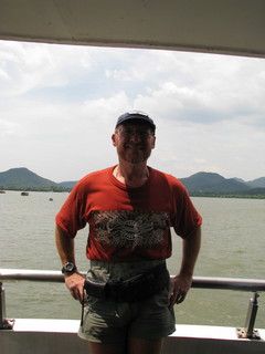 5 6xy. China eclipse - Mango's pictures - Adam on West Lake boat ride