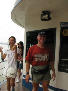 6 6xy. China eclipse - Mango's pictures - Adam on West Lake boat ride