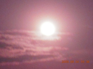 Zion National Park in silhouette with crescent moon