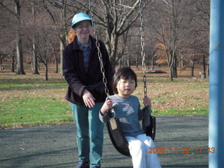 Betsy and Cecelia on swings