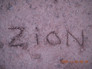 18 72r. Zion National Park - Watchman hike - 'zion' graffiti