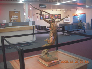 3 72s. statue in Saint George Airport (SGU) terminal