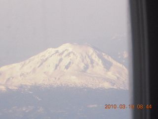 3 75k. Mount Hood (I think) through airliner window