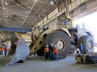 Sean's picture - Bagdad mine tour - Adam, Sean, Kristina, and big, chained tire