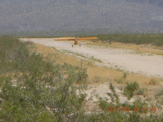 102 77a. Alamo Lake airstrip - landing airplane