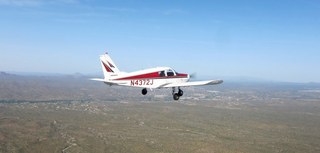 Anne flying in N4372J