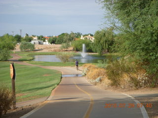 Adam riding bicycle on Green Belt in Scottsdale