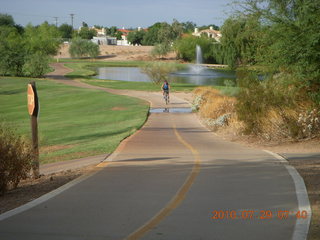 Adam riding bicycle on Green Belt in Scottsdale