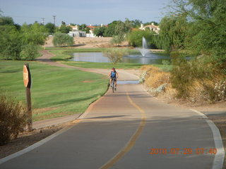 Adam riding bicycle on Green Belt in Scottsdale