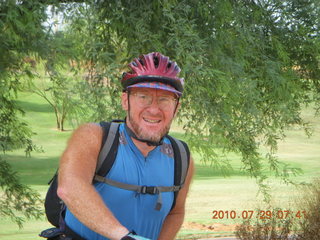 Adam riding bicycle on Green Belt in Scottsdale