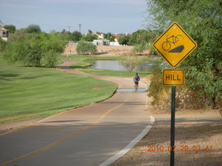 Adam riding bicycle on Green Belt in Scottsdale