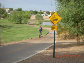 Adam riding bicycle on Green Belt in Scottsdale