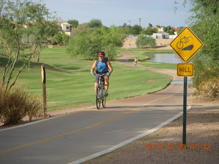 Adam riding bicycle on Green Belt in Scottsdale