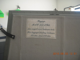 baggage compartment sign for N8377W