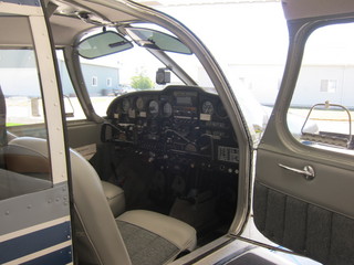 Bob and N8377W in Watkins hangar