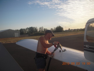 Adam putting fuel in N8377W