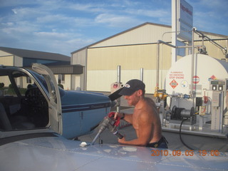 44 7b3. Adam putting fuel in N8377W