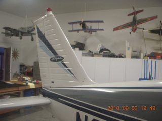 70 7b3. model planes and N8377W tail in Watkins hangar