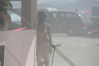 7S5 to DVT trip - Nevada - Black Rock City - Burning Man entrance - woman with face protected