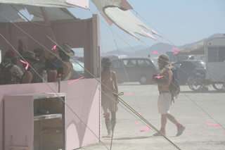 7S5 to DVT trip - Nevada - Black Rock City - Burning Man entrance - woman with face protected