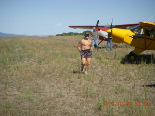 1314 7c2. Adam running at Me-Own airstrip with airplanes around