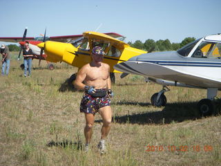 1315 7c2. Adam running at Me-Own airstrip with airplanes around