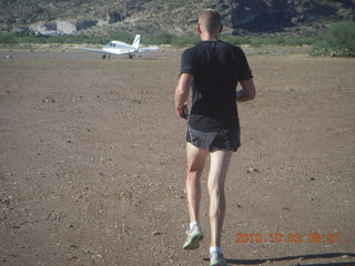 161 7c3. Superior Airport run - Jon running towards N8377W