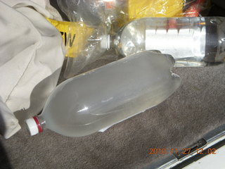 128 7dt. Moab trip - frozen pop bottle still holding water in N8377W