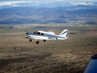 242 7ej. Sean picture - aerial - N8377W in flight