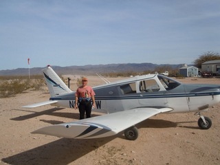 104 7g6. Antoine's pictures - Adam and N8377W at Alamo Lake airstrip