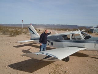 218 7g6. Antoine's pictures - Antoine and N8377W at Alamo Lake airstrip