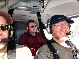 Sky Harbor fly-in - Sarah taking a picture flying in N8377W