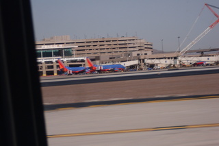 Sky Harbor fly-in - taxiing at PHX in N8377W silhouette