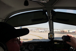 359 7g8. Sky Harbor fly-in - taxiing at PHX in N8377W - silhouette