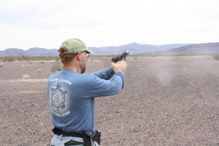 V.N.G.R.N. - Adam shooting with a puff of smoke from the gun