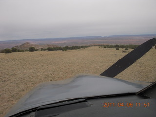 97 7j6. Eagle City airstrip through windshield of N8377W