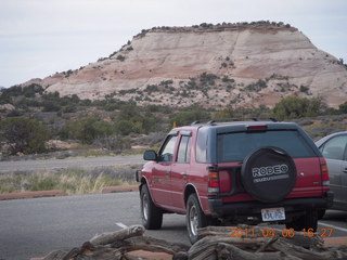 185 7j6. CanCanyonlands Mesa Arch parking lot with Isuzu Rodeo