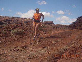 111 7j7. Canyonlands Lathrop hike/run - Adam running (tripod)
