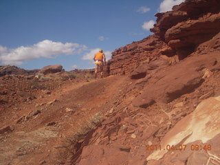 112 7j7. Canyonlands Lathrop hike/run - Adam running (tripod)