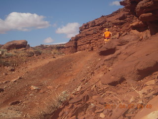 113 7j7. Canyonlands Lathrop hike/run - Adam running (tripod)
